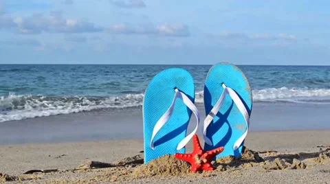 Flip flops and waves.mp4 Stock Footage 29665734
