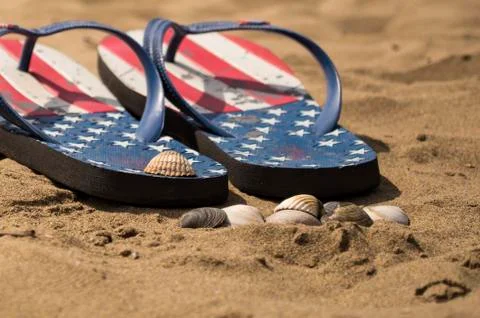 Flip flops on the beach Stock Photos