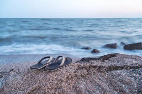 Flip flops on the beach Foto stock