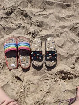 Flip flops on the beach Stock Photos