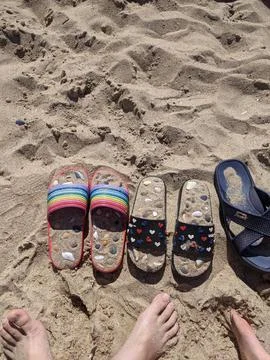 Flip flops on the beach Stock Photos