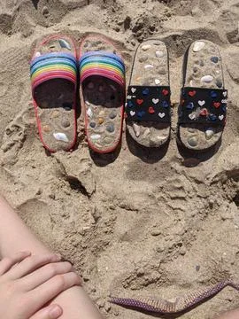 Flip flops on the beach Stock Photos
