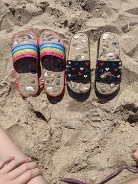 Flip flops on the beach Stock Photos