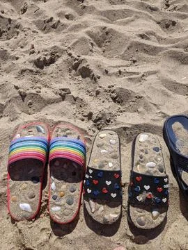 Flip flops on the beach Stock Photos