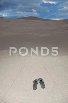 Flip Flops On A Sand Dune