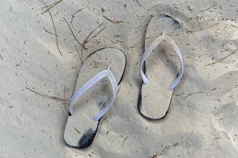 Flip flops sand Stock Photos