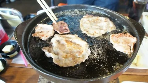 Flip over cooking BBQ grill slice pork, beef on hot pan with butter 스톡 동영상 83917581