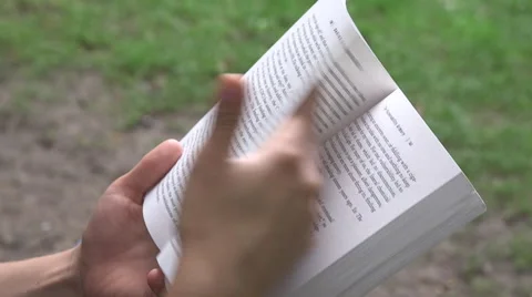 Flip page of book Stock Footage 65781776