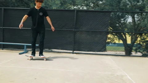 Flip Trick Down Ramp At Skatepark Video stock 168024929