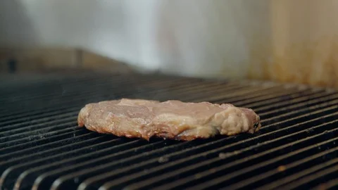 Fliping steak on the grill Stock-Footage 92187213