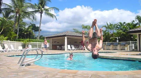 Flipping In and Out of Pool Stock Footage 23533076