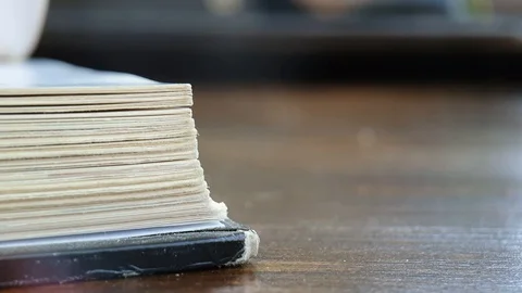 Flipping a book Stock-Footage 129202493