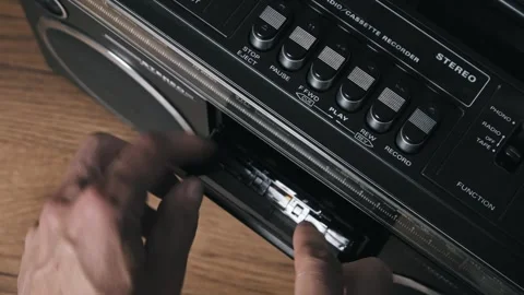 Flipping Cassette Tape to Side B in Player Video stock 318789715