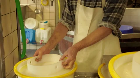 Flipping Cheese in a Mold Stock Footage 36194915