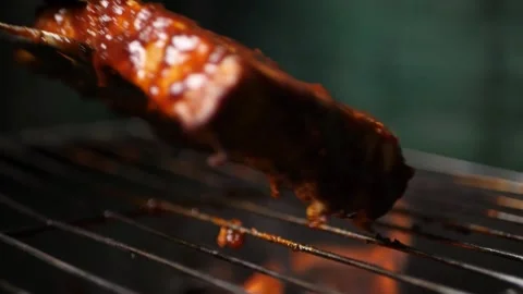 Flipping Cheese Steak on a grill with dramatic smoke and fire Stock Footage 136653274