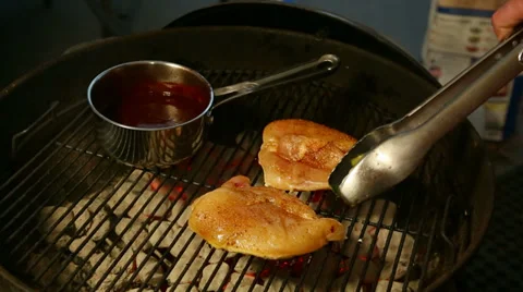 Flipping Chicken on the Grill Video stock 37715369