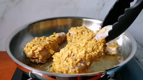 Flipping Chicken Legs Stock Footage 161006113