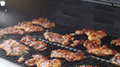 Flipping Cooked Chicken on the Grill 스톡 동영상 38006296