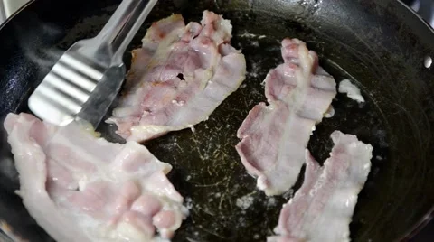 Flipping Greasy Bacon Video stock 54109581