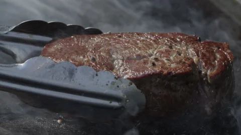 Flipping Grilled Meat 7 스톡 동영상 332520030