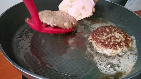Flipping Ground Beef Patty Stock Footage 231119547