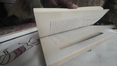 Flipping Opening Old Rusty ancient Mythology Book closeup wide micro shot Stock Footage 200357654