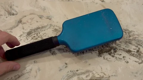 Flipping over Hair Brush - Slow Motion Stock Footage