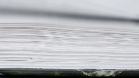 Flipping pages of a book. Macro shooting Stock Footage 72561833