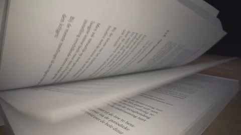 Flipping pages on textbook in slowmotion Video stock 124014724