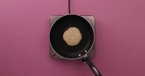Flipping the pancake 1 Stock Footage 132147730