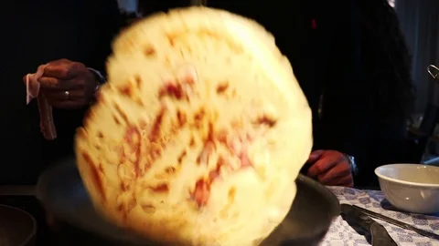 Flipping pancake in pan Stock Footage 129432083