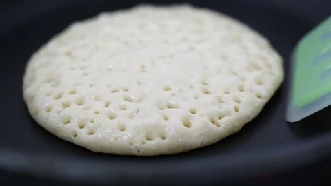 Flipping pancake on teflon pan. Stock Footage 90415234