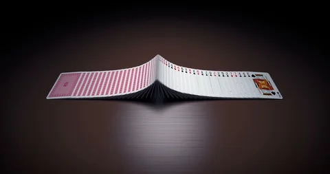 Flipping playing cards on the table Stock Footage 129774610