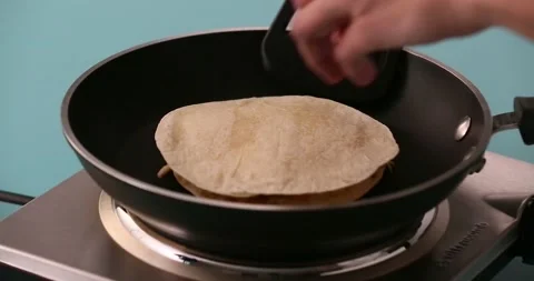 Flipping the quesadilla 2 스톡 동영상 132203668