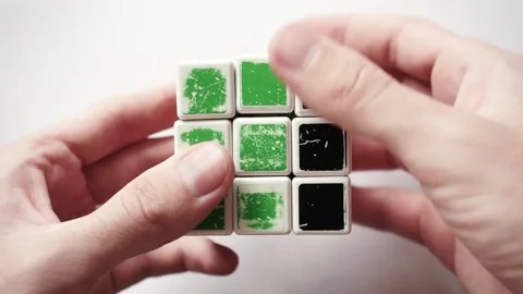 Flipping a Rubik's Cube in Human Hands Stock Footage 208843946