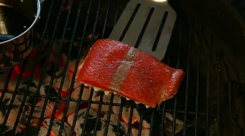 Flipping Salmon on Grill Stock Footage 37715136