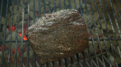 Flipping A Steak Stock Footage 24407389