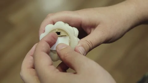 Flipping on off switch on small decorative lamp closeup. Stock Footage 334340859
