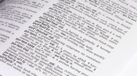 Flipping though dictionary V4 - HD Stock Footage 5476699