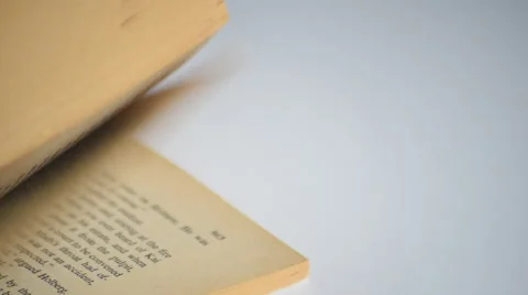 Flipping through all pages of a book Stock Footage 67627053