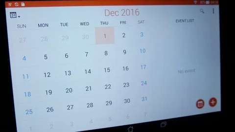 Flipping through calendar on tablet screen Video stock 70678058