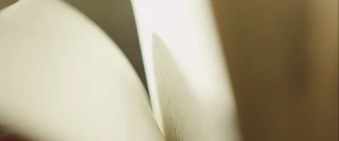 Flipping through a notebook in slow motion Stock Footage 47183038