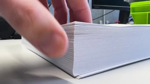 Flipping Through Paper Stack Close Up Stock Footage 332642838