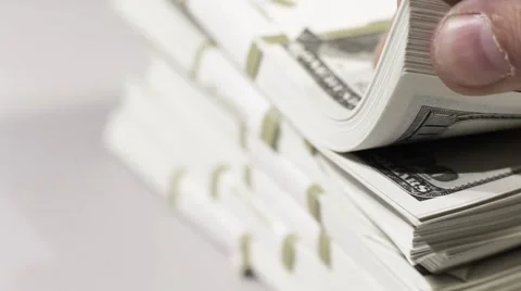 Flipping Through the Stack of Dollars Stock-Footage 43916549
