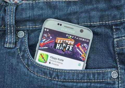 Flippy Knife mobile game on screen of Samsung Stock Photos