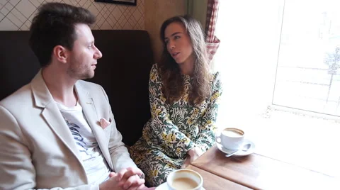 Flirting couple in cafe Stock Footage 51793889
