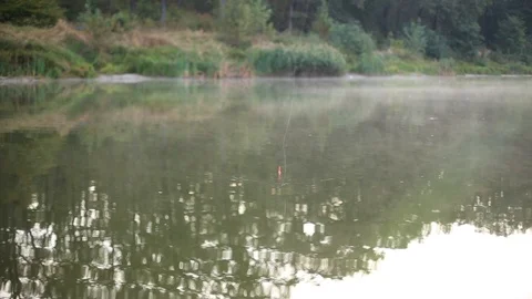 Float and fishing rod 库存影片 115650468
