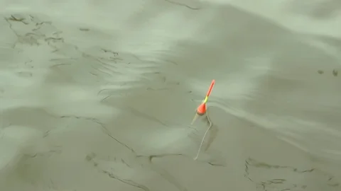 Float fishing on small waves Stock-Footage 89774856