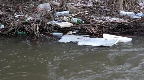 Float garbage in city river Stock Footage 59947447