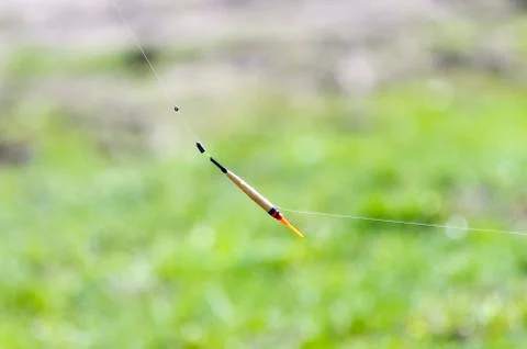 Float hanging on the line Stock Photos
